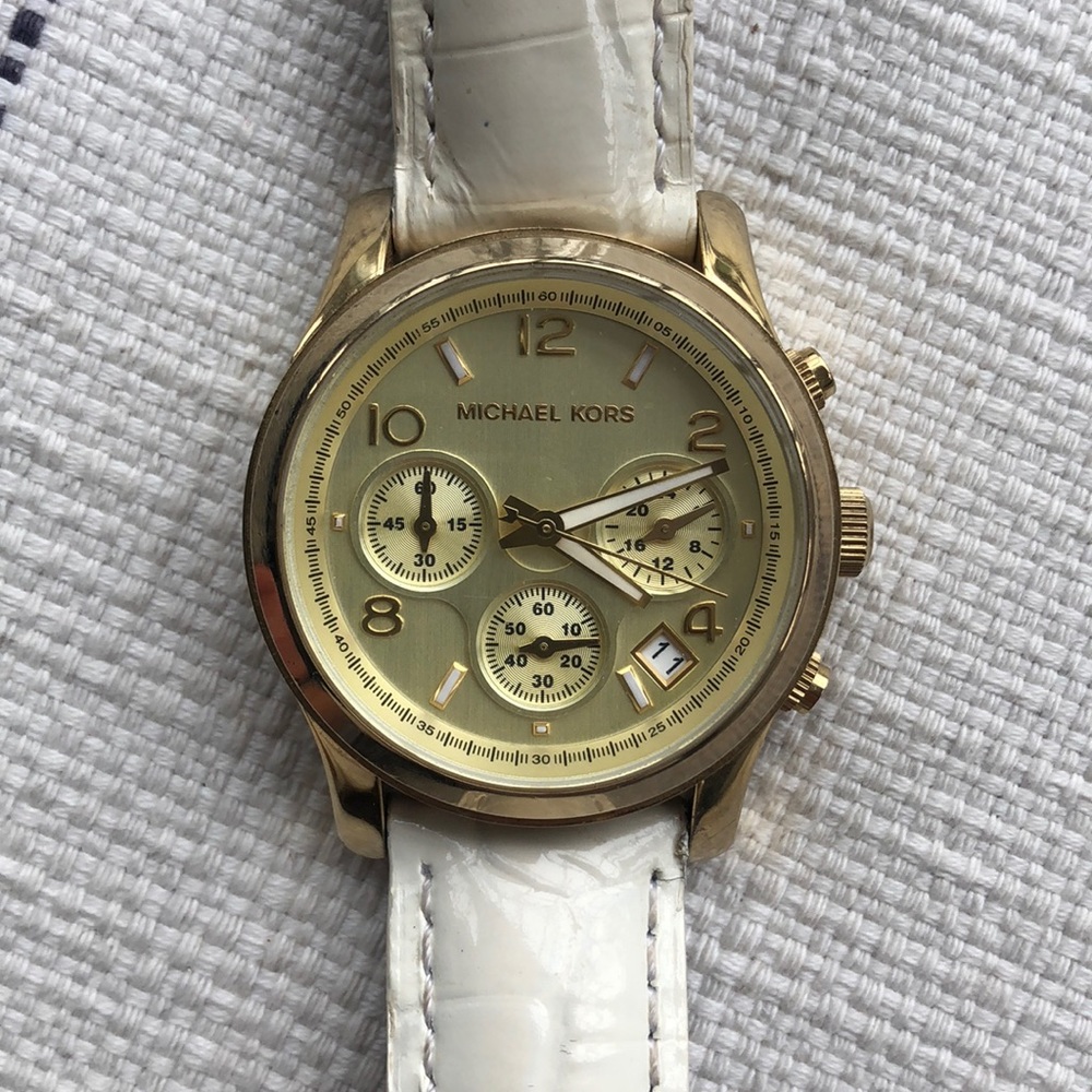 Gold MK watch